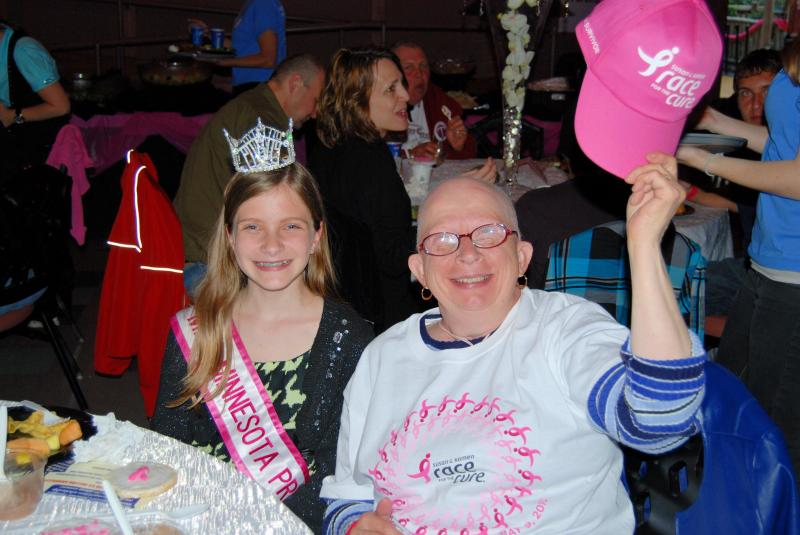 At fundraising dinner with a survivor
